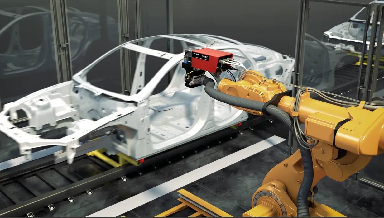 Bild 3:	Der Laserkopf kann auf Manipulatoren oder an Industrierobotern montiert werden, um jede gewünschte Stelle zu erreichen. (Urheber: Trotec)